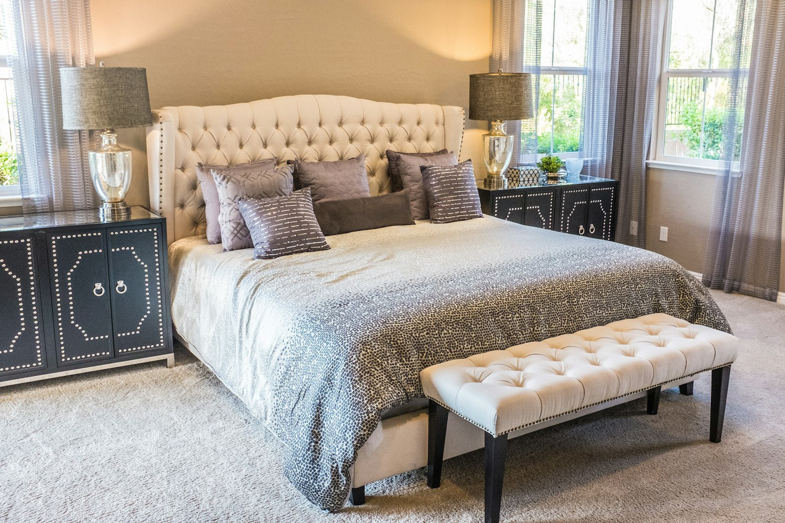 Linen layering for a bedroom that breathes