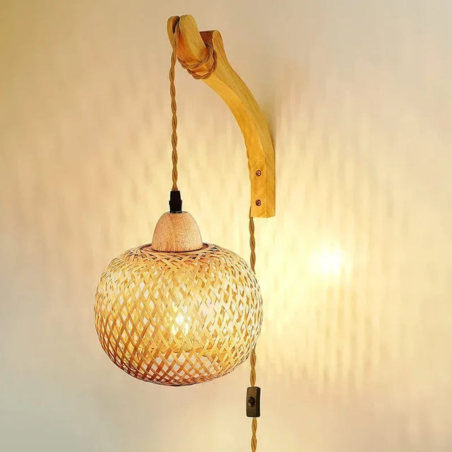 Lamp glowing in a study above a reading nook