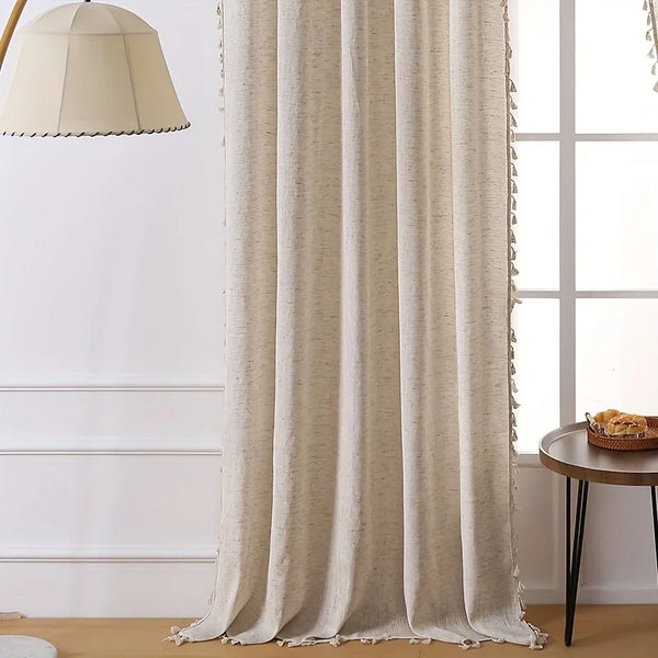 Sunlight glowing through linen curtain tassels