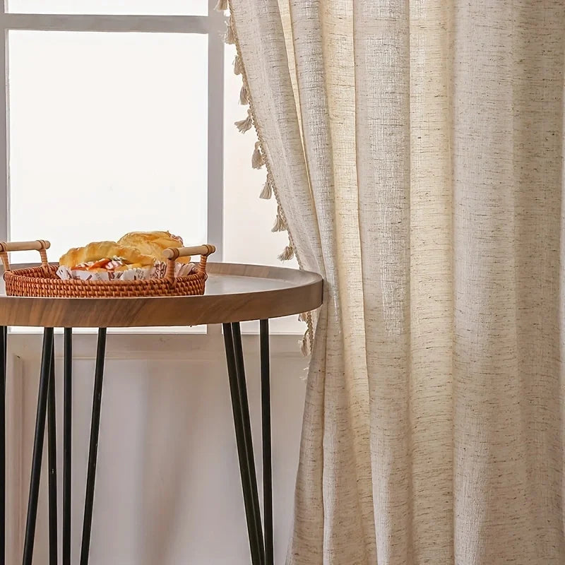 Full 84-inch length linen curtain hanging from a ceiling rod