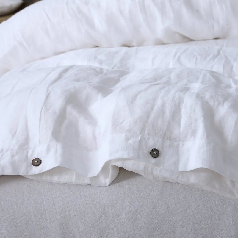Full bed dressed in linen